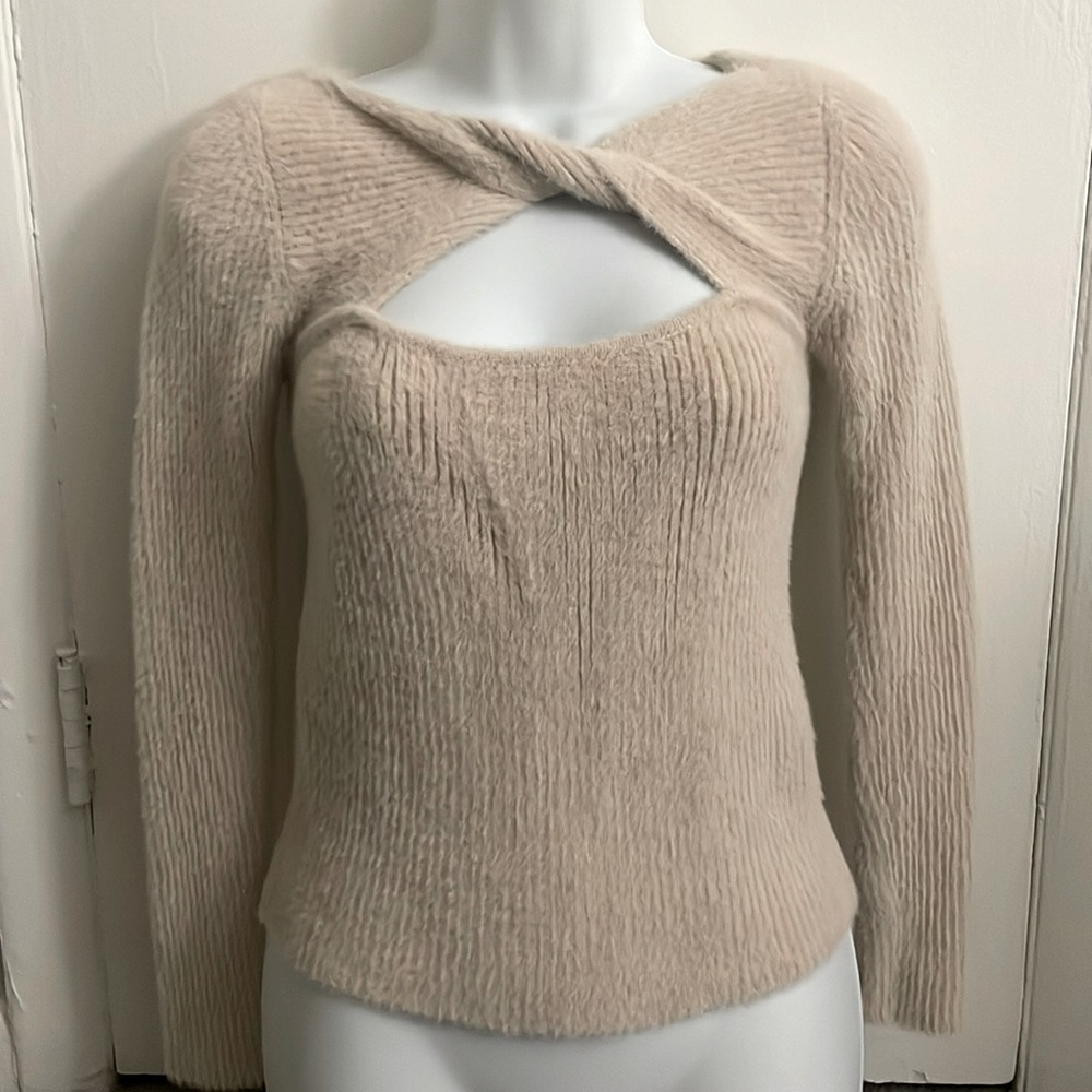 Tan sweater with twist